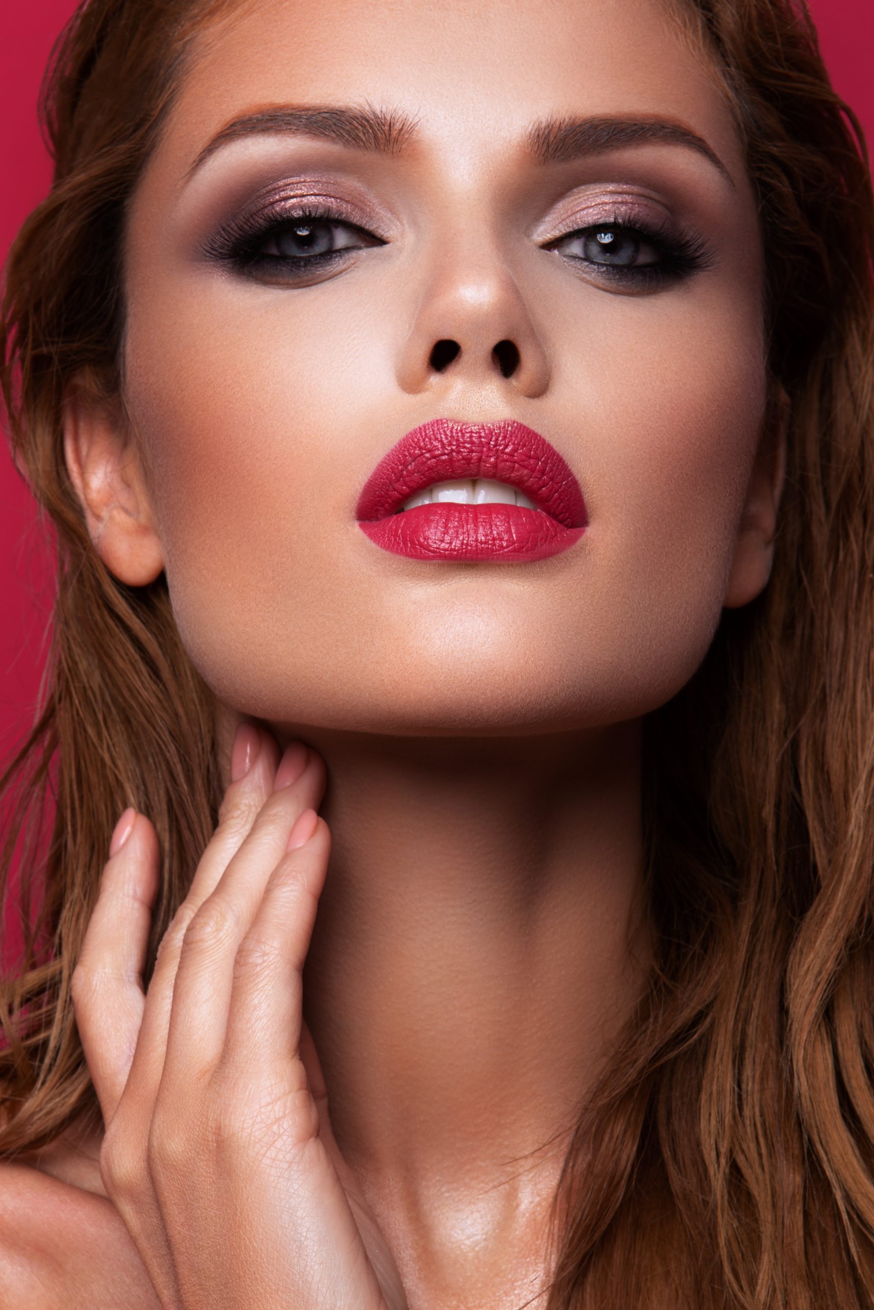 Portrait of beautiful girl with pink lips and blue eyes
